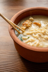 shoyu ramen in traditional bowl close up