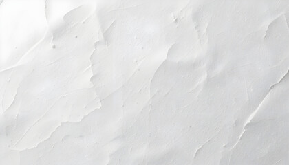 Obraz premium Close-up view of textured white stucco wall