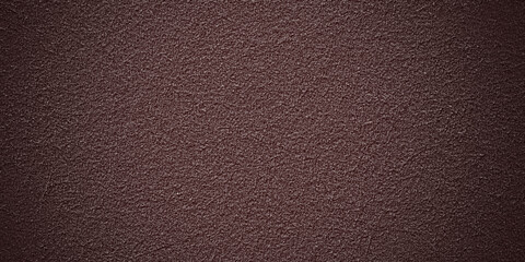 Red background texture cement wall. Embossed background. Texture of paint on grooved plaster