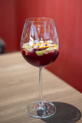 A glass of Sangria, a refreshing Spanish beverage made with red or white wine, fresh fruits