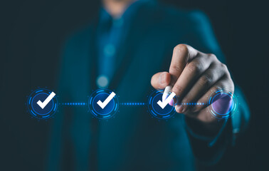 Interactive Workflow Progress and Achievement. Businessman Using Digital Check Mark System to Track...