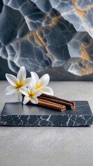 Fototapeta premium Refreshing Spa Banner Featuring Vanilla Flower Cinnamon Roll and Grey Marble for a Soothing and Inviting Wellness Display Beauty Poster Mockup