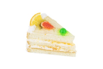 Layered cheesecake piece with orange and berries isolated on white background.