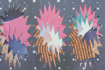 abstract layered machine-cut paper shapes and stencils with starburst effect