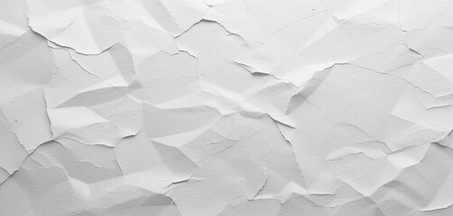 Abstract close-up of white textured crumpled paper creating a dynamic and artistic background.
