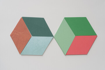 two isometric boxes on blank paper