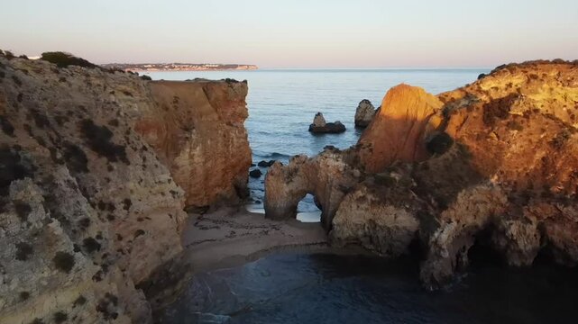 Aerial video above Gruta das Baratas Algarve Portugal