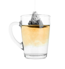Brewing aromatic tea. Cup with teabag isolated on white