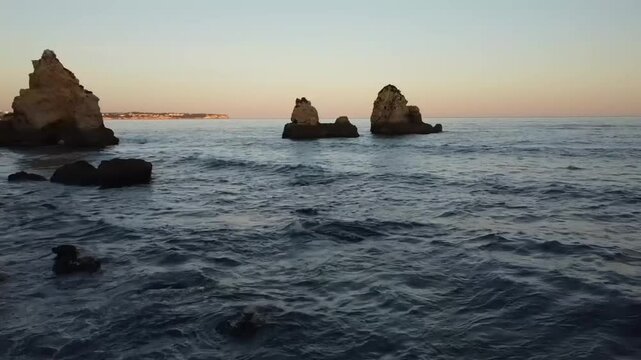 Aerial video above Gruta das Baratas Algarve Portugal