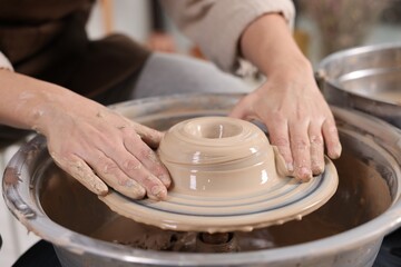 Hobby and craft. Woman making pottery indoors, closeup