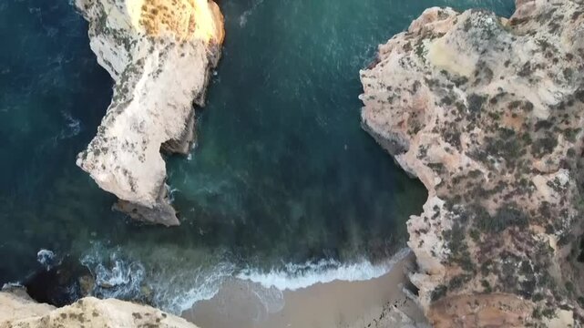Aerial video above Gruta das Baratas Algarve Portugal
