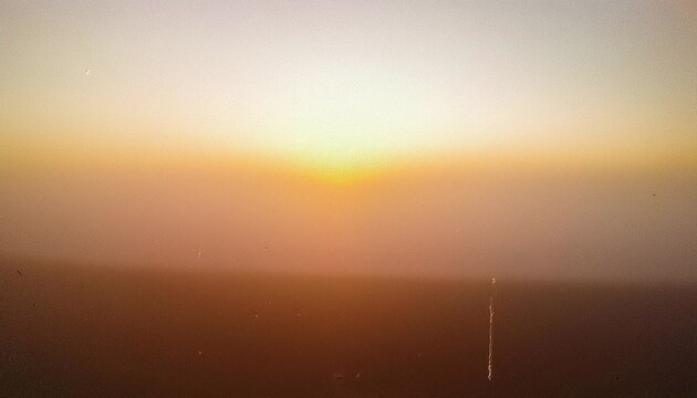 Vintage distressed abstract old photo of foggy sunrise, film grain, dust and scratches texture effect - Powered by Adobe