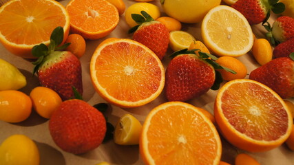 Assorted citrus fruits red sicilian tarocco orange, clementines, kumkuwat, mini sicilian lemon, lemon, strawberries from basilicata, seasonal fruits, high vitamin c, energy boost