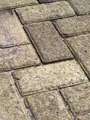 The texture of the stone floor is arranged vertically and horizontally