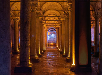 Fototapeta premium Illuminated Interior of an Ancient Underground Columned Structure, Istanbul, Turkey
