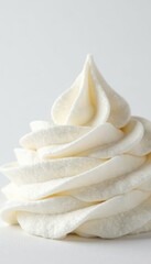 Fluffy peaks of whipped cream, pristine white background, dairy, gastronomy, frothy