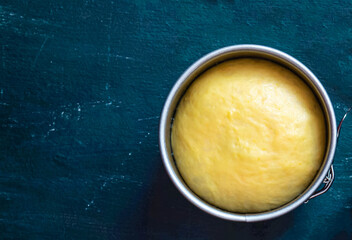 Easter cake dough in a metal pan. Preparation before baking Easter cake