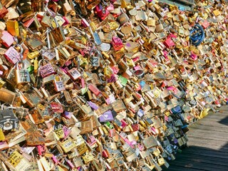 Fototapeta premium Closeup of Love locks on a fence
