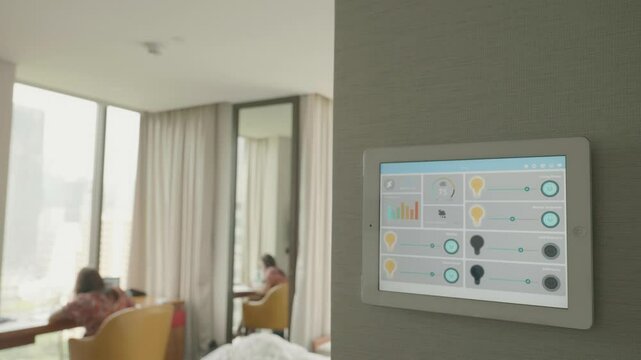 A sleek smart room control interface displayed on a tablet in a modern hotel room, showcasing a blend of technology and comfort. The room's contemporary design enhances the guest experience.