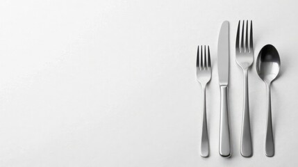 Elegant Stainless Steel Cutlery Set on White Background Perfect for Menu Design or Restaurant Promotion