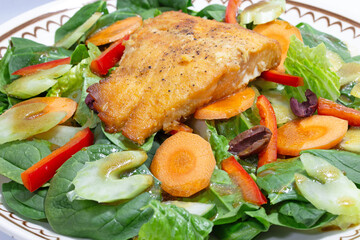 Baked Salmon Fillet on Mediterranean Salad