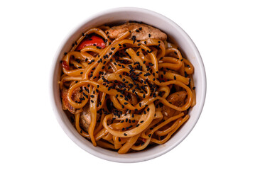 Delicious Asian food udon with noodles, chicken, hot pepper, vegetables