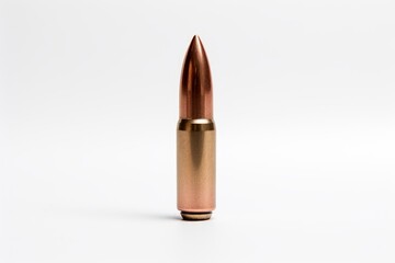 Studio shot of a single rifle bullet standing on a white background