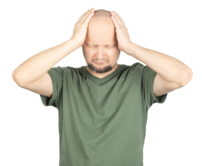 Bald man in green t-shirt experiencing intense headache and fibromyalgia pain