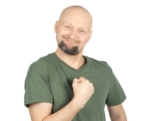 Energetic man making a strong fist gesture with confidence