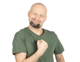 Energetic man making a strong fist gesture with confidence