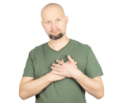 Man expressing gratitude with hands on his chest
