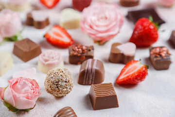 Valentines Day card with flowers chocolates and strawberries.