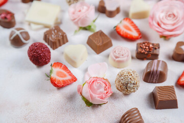 Valentines Day card with flowers chocolates and strawberries.