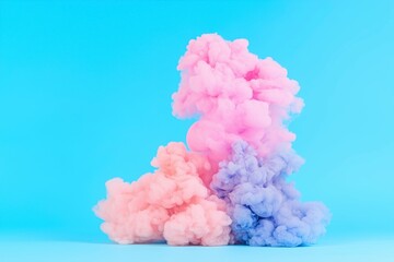 Fototapeta premium Colorful Smoke Plume on Blue Background Creating Artistic Visual Effects