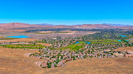 Aerial view of the residential district North of Sparks Nevada in the Spanish Springs, Wingfield Springs area towards Pyramind Lake during summer.