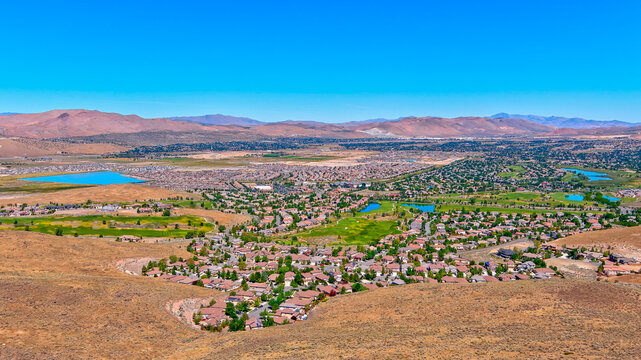 Aerial view of the residential district North of Sparks Nevada in the Spanish Springs, Wingfield Springs area towards Pyramind Lake during summer.