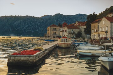 Scenic Mediterranean Harbor at Sunset in Coastal Village at the bay of Kotor