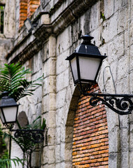 Post lamps in the walls of Intramuros Manila.