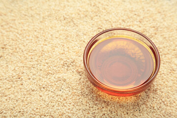 Sesame seeds and sesame oil. Top view