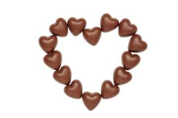 Red chocolate sweets as heart isolated on white background. Valentine's day concept.