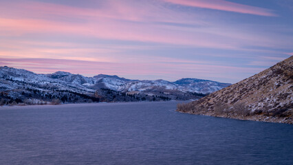 Fototapeta premium Horsetooth Reservoir at foothills of Rocky Mountains in northern Colorado, winter scenery at dusk