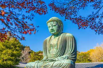 Ancient bronze statue of the Great Buddha Daibutsu at Kotoku-in temple in Kamakura, Japan. It is an important landmark and a popular destination for tourists.