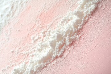 Fototapeta premium Close-up of Powder on a Pink Background
