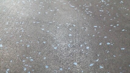 Textured Floor with Rough Surface and Speckled Patterns