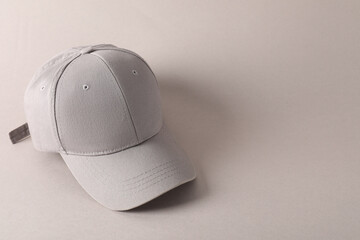 Stylish baseball cap on light grey background. Mockup for design