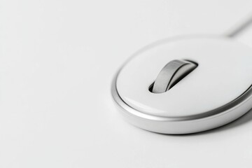 A close-up view of a small mouse sitting on a wooden table, looking around curiously