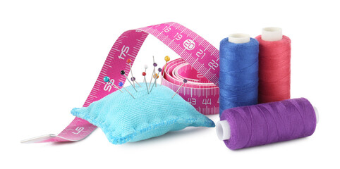 Many different sewing supplies isolated on white