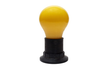 incandescent yellow colored glass Christmas bulb screwed in medium size black plastic lampholder with shade ring on end of threaded shell. isolated on white background