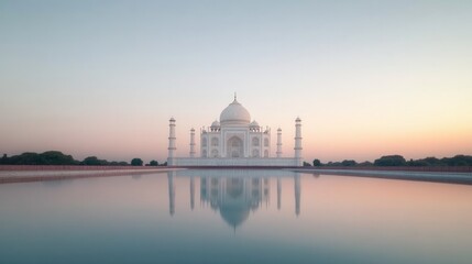 Obraz premium Majestic mausoleum reflects in calm water at dawn, showcasing in