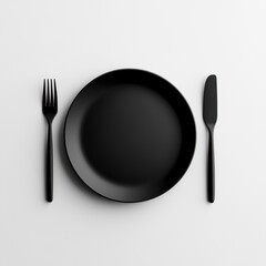 Black plate, fork, knife on white background, ready for a meal, for menus, ads